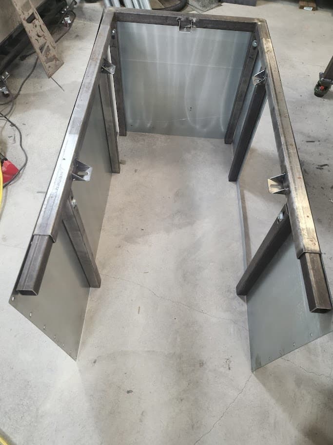 Custom fabricated metal HVAC base frame in the shop